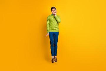 Sticker - Full length body size profile side view of nice funky glad delighted cheerful guy jumping having fun isolated on bright yellow color background