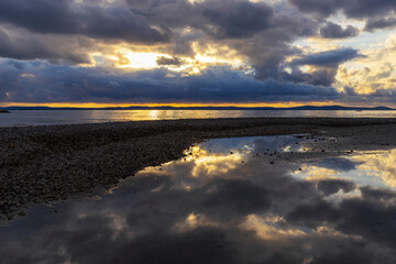 Wall Mural - Beautiful sunset at the sea. Sky reflected in the water. Nin, Croatia