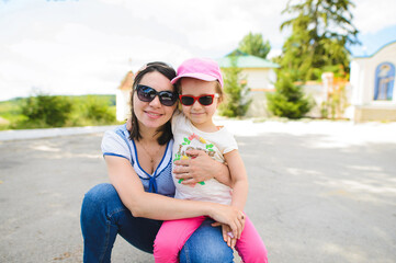 Wall Mural - portrait of smiling mother and daughter