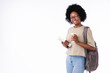 Smart african-american student holding a cup of coffee isolated over white background