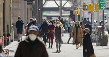 Anonymous Crowd Of People Walking Street Wearing Masks During Covid 19 Pandemic In New York City
