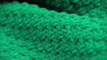 Super Close-up. Details Of Green Knitted Wool Fabric. Textile Background. Macro