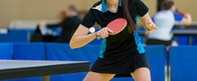 Ping Pong Table, Woman Playing Table Tennis With Racket And Ball In A Sport Hall