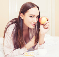 Wall Mural - young pretty brunette woman laying in bed, luxury white interior vintage having breakfast cute