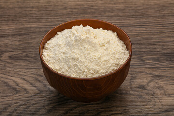 Wheat flour heap in the bowl