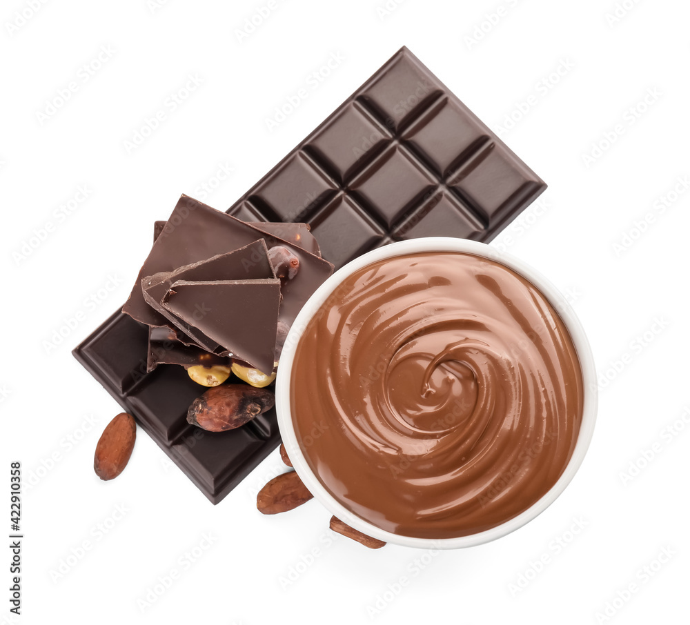 Bowl of tasty melted chocolate on white background
