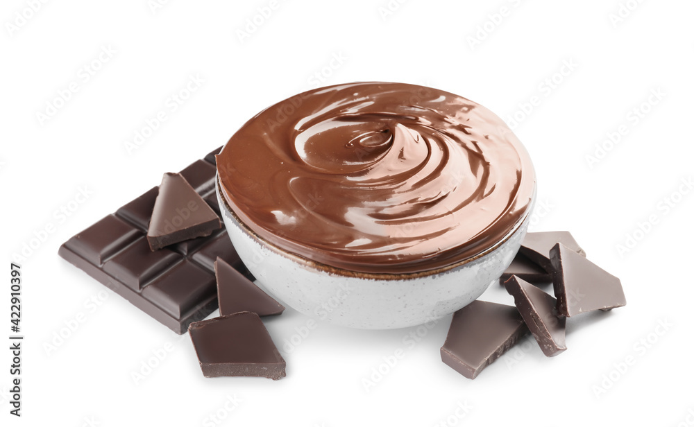 Bowl of tasty melted chocolate on white background