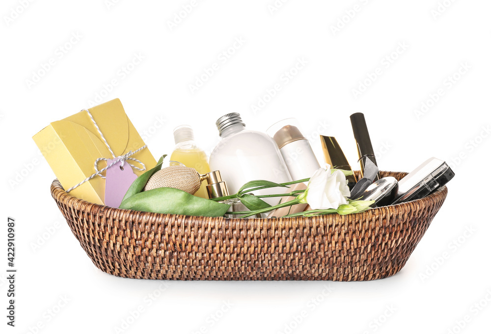 Gift basket with cosmetics on white background