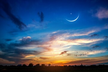 Wall Mural - crescent moon with beautiful sunset background