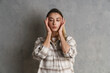 © Drobot Dean - Upset displeased young woman suffering from a headache