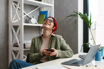 Wall Mural - Young mid aged woman entrepreneur