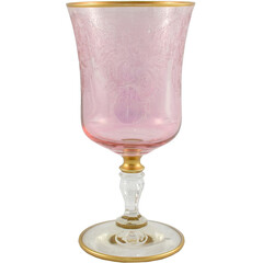 Colored wine glass with square edge. Bohemian art glassware vintage luxury stemware decorated with gold ornaments. Retro crystal goblet isolated on white background with clipping path. 