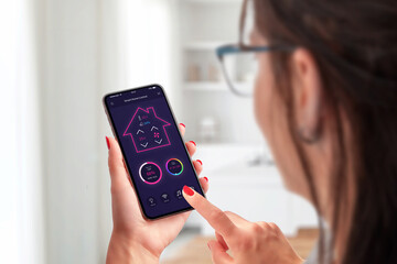Aufkleber - Smart home control app concept on smart phone in woman hands
