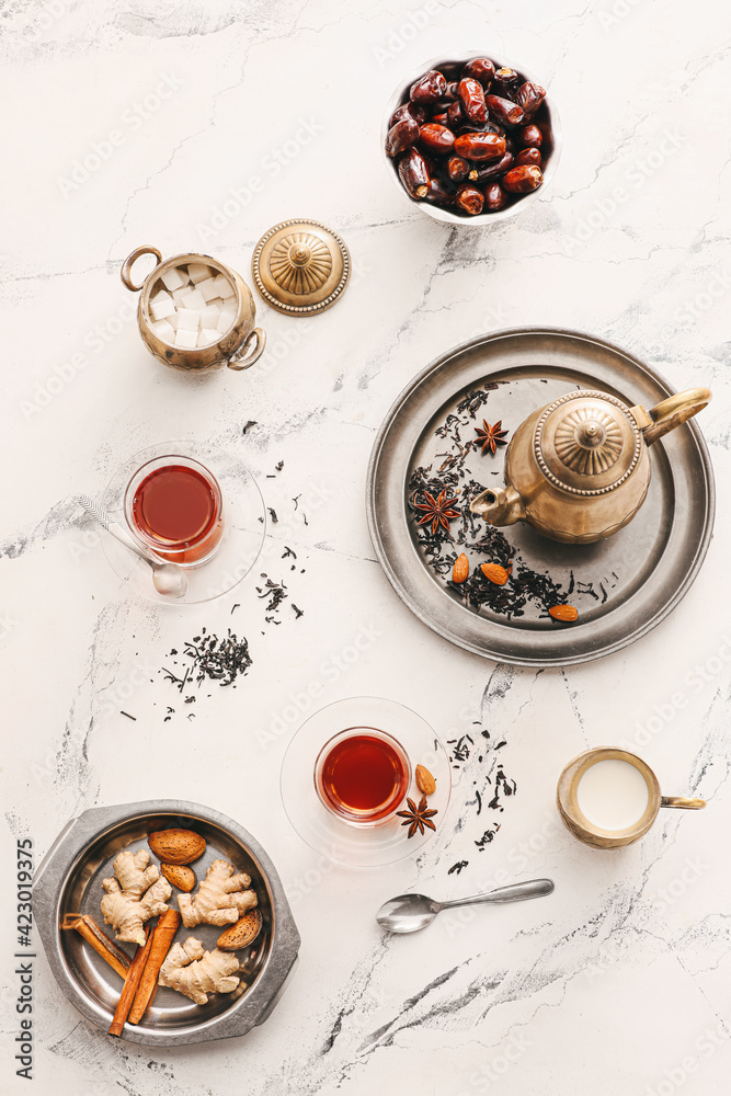 Composition with glasses of tasty Turkish tea on light background - obrazy, fototapety, plakaty 