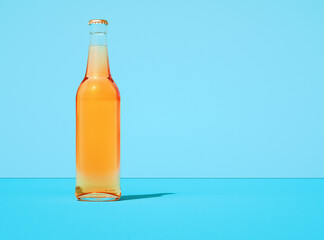 Leinwandbilder - Transparent glass beer bottle on retro light blue color background. Bottle filled with yellow liquid.