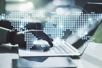 Aufkleber - Abstract creative world map with connections and hands typing on laptop on background, international trading concept. Multiexposure