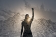 © kieferpix - Strong powerful woman standing on a mountain. People inspiration and motivation concept.