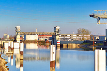 Harbor flood barrage entrance gate called 'Hafensperrtort' at rhine river port in Karlsruhe, Germany