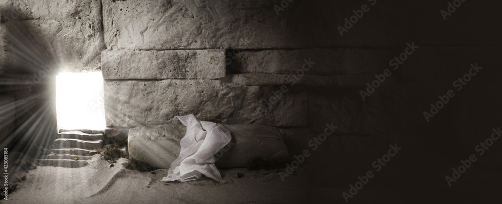 Empty tomb while light shines from the outside. Jesus Christ Resurrection. Christian Easter concept. - obrazy, fototapety, plakaty 