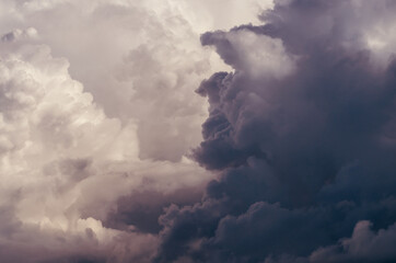 Wall Mural - Amazing sunset picture with fluffy clouds, against sun