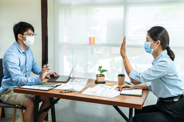 Aufkleber - Two business colleagues wearing face mask to brainstorming business project and giving high five to each other