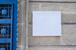 © OceanProd - empty white blank plate on the entrance signboard on textured wall mockup