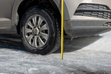 Measuring The Vehicle's Ground Clearance With A Ruler. Evaluating The Vehicle's Off-road Capabilities. Winter Road