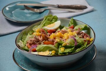 Wall Mural - Tuna Fish Salad with Lettuce, Cherry Tomatoes, Cucumber, boiled eggs, onions and Corn