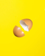 two eggshells float in the air. stock photo