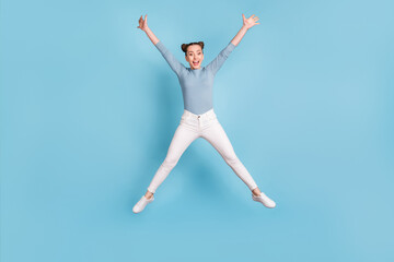 Sticker - Full length photo of positive pretty young girl jump up air star pose isolated on blue color background