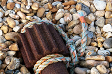 Nylon Rope And Old Winch Gear Laying On The Beach At Dungeness