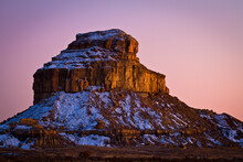 Fajada  Butte glows in the soft, pastel colors of dusk at Chaco Culture National Historic Park, New Mexico.   