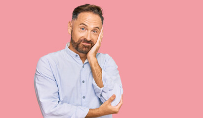 Poster - Handsome middle age man wearing business shirt thinking looking tired and bored with depression problems with crossed arms.