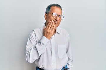 Sticker - Middle age indian man wearing casual clothes and glasses touching mouth with hand with painful expression because of toothache or dental illness on teeth. dentist