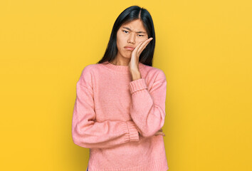 Sticker - Beautiful young asian woman wearing casual winter sweater thinking looking tired and bored with depression problems with crossed arms.