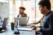 © kleberpicui - Multiethnic business team meeting in the office.