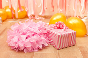 Wall Mural - gift box on pink and golden birthday decorations