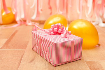 Wall Mural - gift box on pink and golden birthday decorations