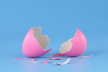 Pink Easter Egg Cracked Open And Broken Into Pieces.
