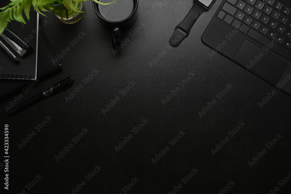 Modern workplace with smart watch, coffee cup, keyboard, notebook and copy space on black leather. - obrazy, fototapety, plakaty 