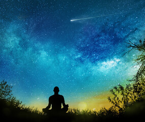 Wall Mural - silhouette of man practicing outdoors at night