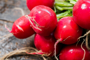 Raphanus sativus. radishes. fresh radishes.fresh radishes on a wooden table