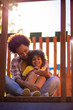 © liderina - Mother and daughter on playground.