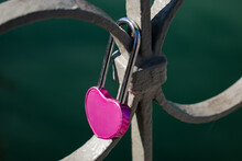 Heart Shaped Pink Love Padlock On Bridge Rail