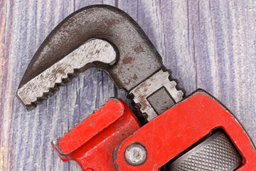 old wrench on wooden background