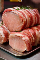 Wall Mural - Raw pork loin in the counter of a butcher's shop