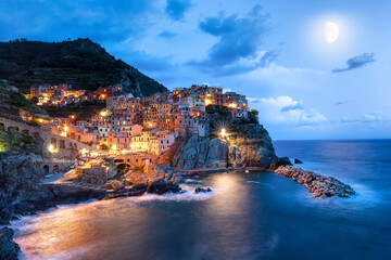 View of Manarola village and moon at night, Cinque Terre. Italy, Europe

Bright pink sunset at seaport in Brindisi, Adriatic Sea. Italy