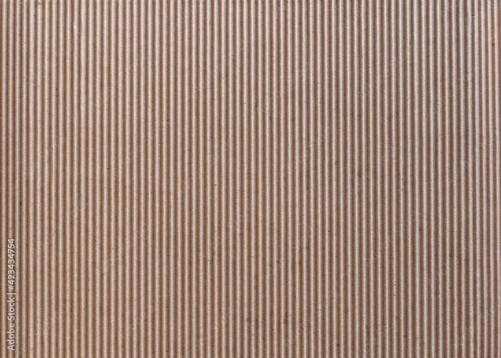 Texture of vertically corrugated brown cardboard, background. - obrazy, fototapety, plakaty 