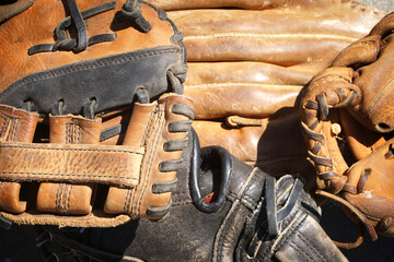 Canvas Print - Old worn baseball and softball gloves