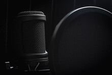 Close Up Black Studio Microphone With Pop Filter
